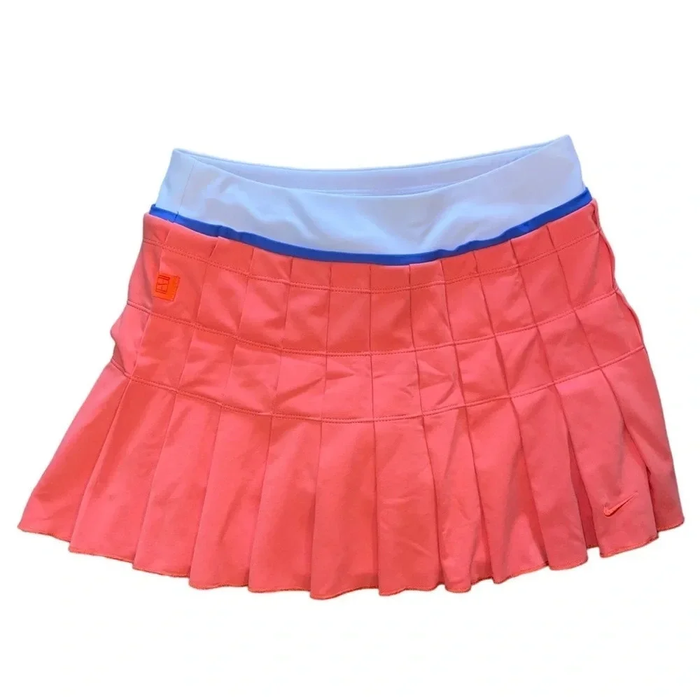 NIKE Fit Dry Pleated Tennis Skort Size XS Salmon Coral Pink Golf Athletic Spring